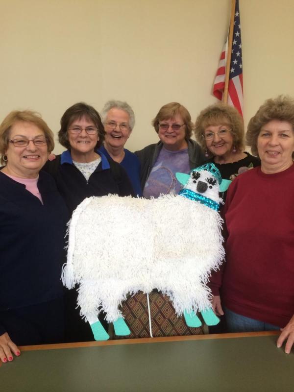 ladies with fake sheep